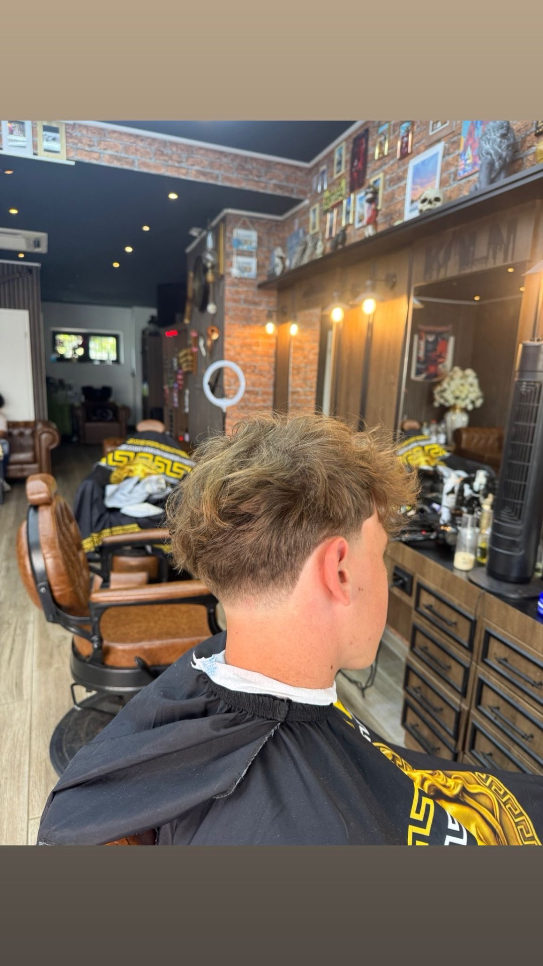 Oscar Barbershop haircut 2